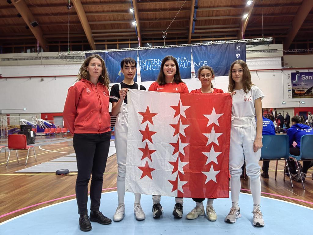 Les 4 Valaisans U14 et le coach Ambre Civiero